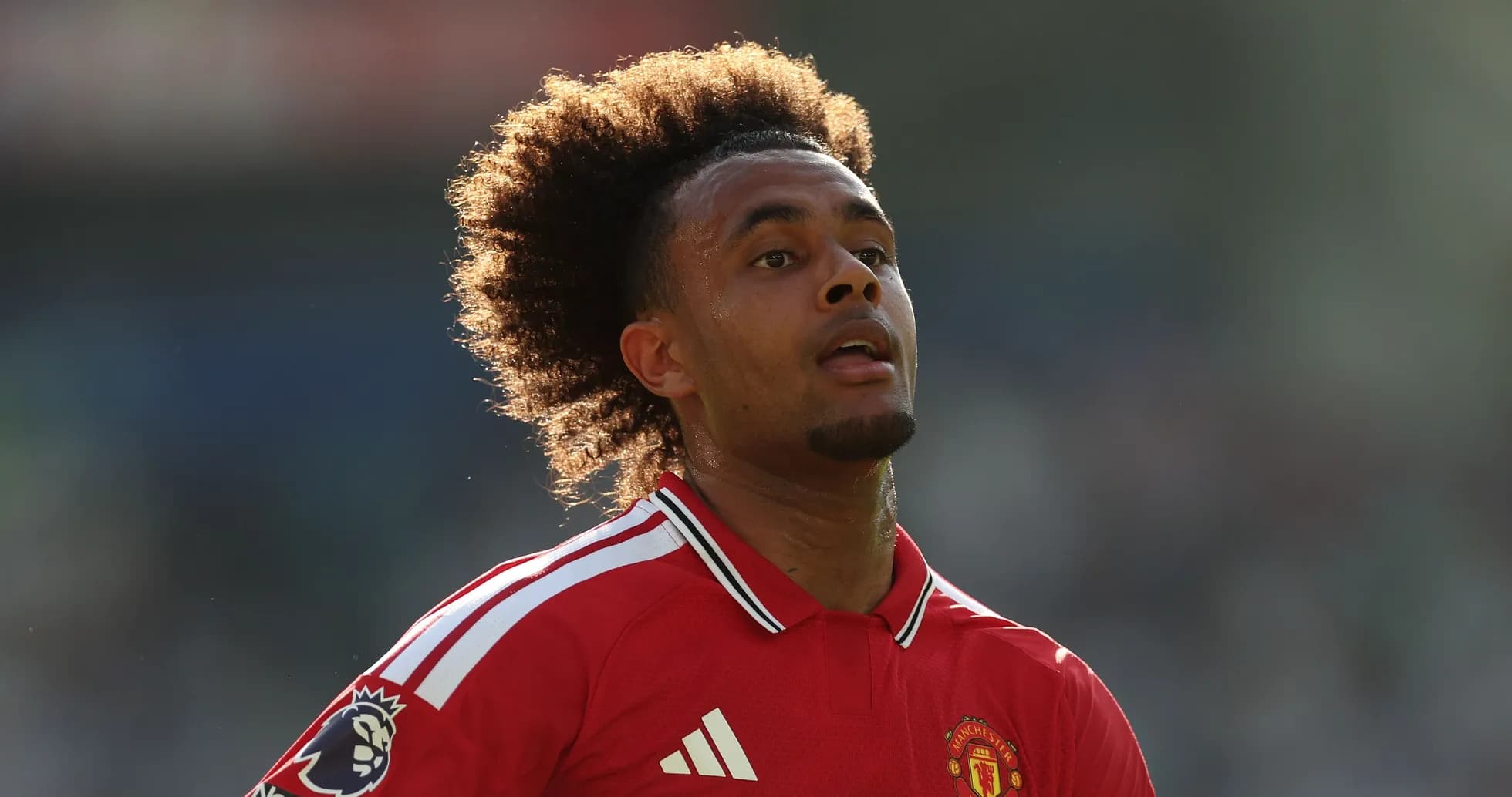 Player in Manchester United kit during match Player in Manchester United kit during match