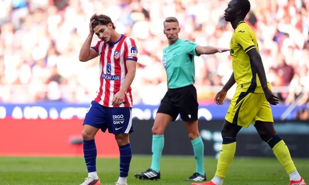 Atletico Madrid player reacts after a foul during match Atletico Madrid player reacts after a foul during match