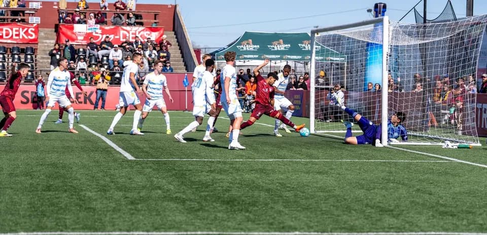 Player attempting to score against Detroit City Player attempting to score against Detroit City