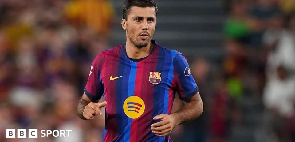 Player in Barcelona jersey running on the field Player in Barcelona jersey running on the field