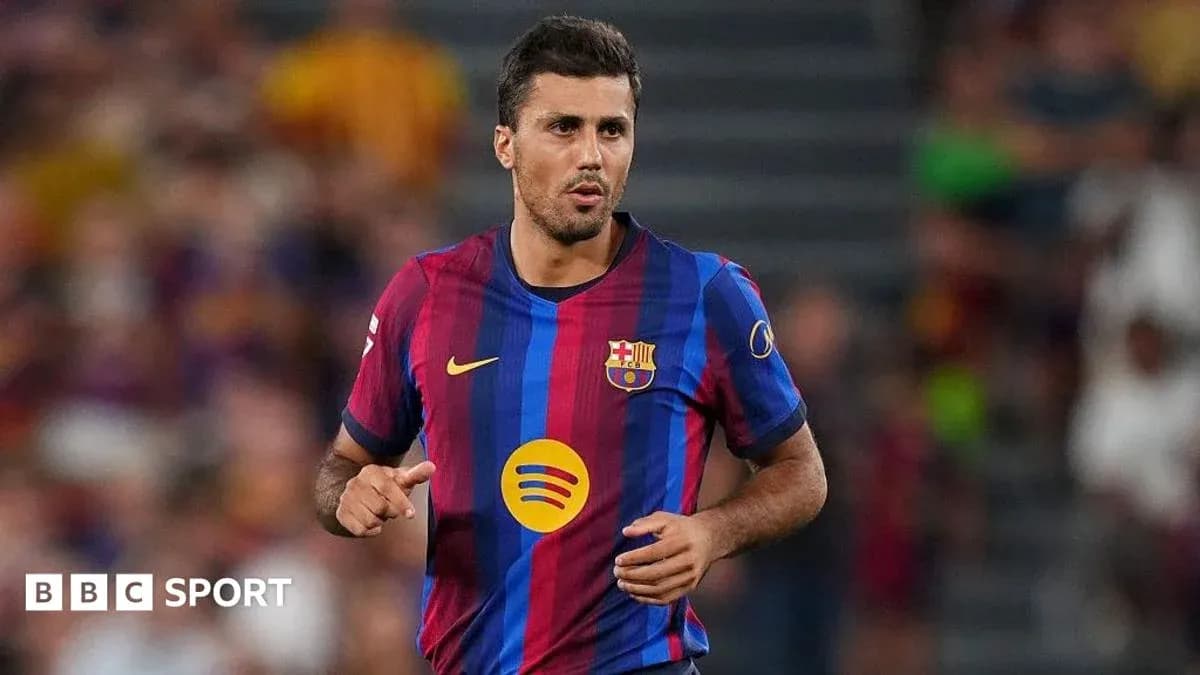 Player in Barcelona jersey running on the field Player in Barcelona jersey running on the field