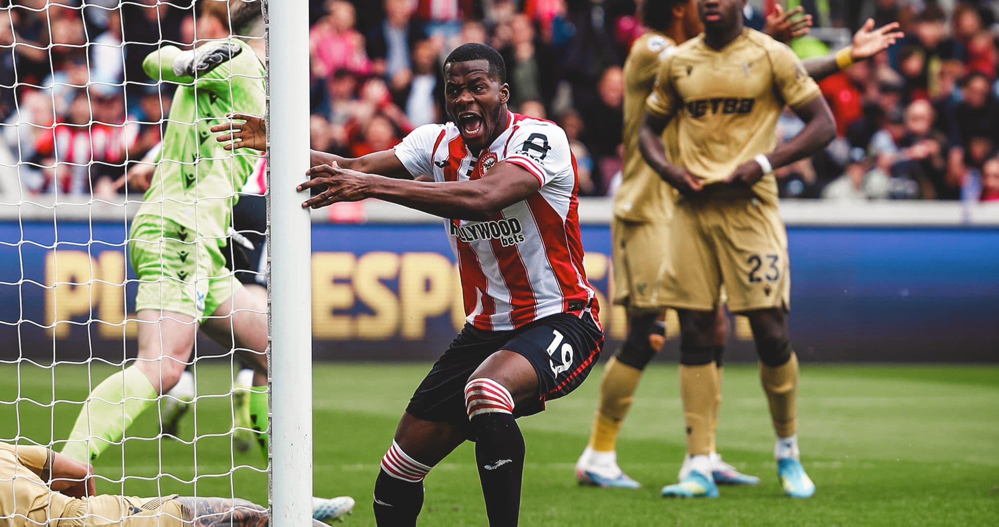 Brentford player celebrating near the goal Brentford player celebrating near the goal