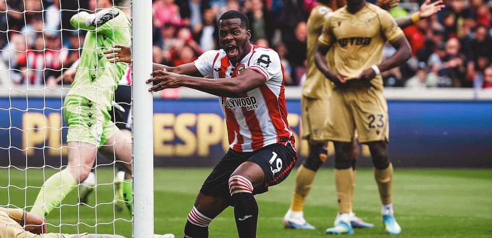 Brentford player celebrating near the goal Brentford player celebrating near the goal