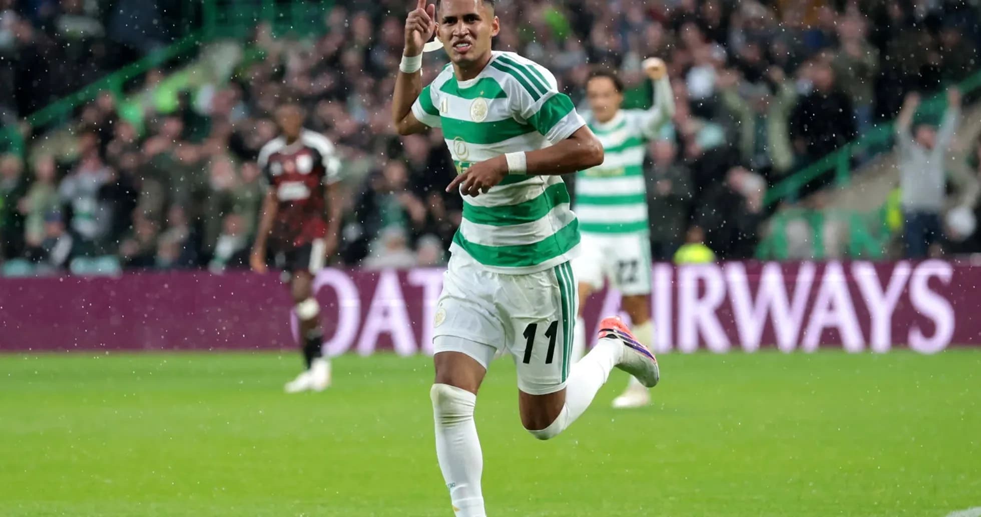 Celtic player celebrating a goal in UEFA match Celtic player celebrating a goal in UEFA match