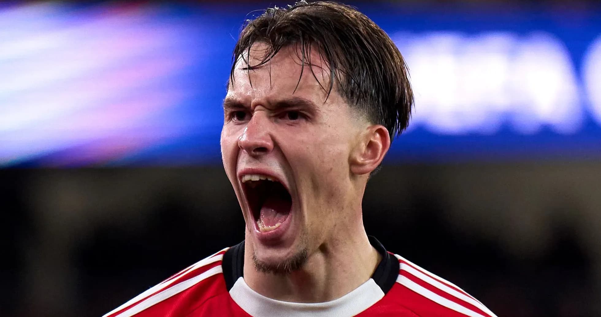 Player celebrating passionately during a match Player celebrating passionately during a match