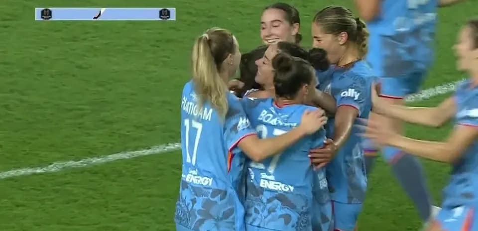 Houston Dash players celebrating a goal Houston Dash players celebrating a goal