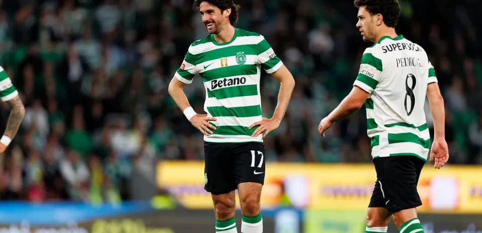 Two Sporting CP players on the field during match Two Sporting CP players on the field during match