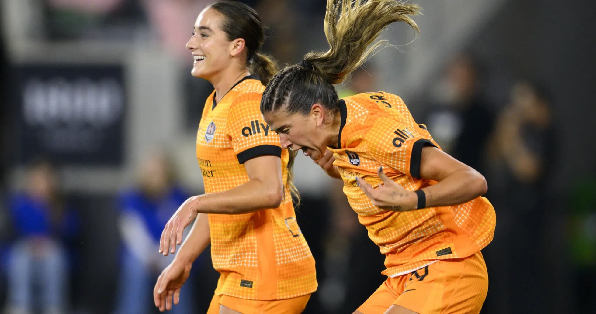 Players celebrating during NWSL match Players celebrating during NWSL match