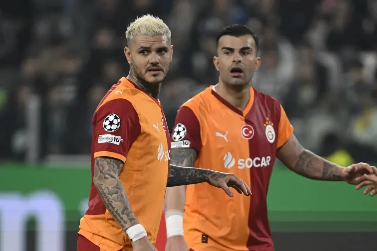 Two Galatasaray players on the field during match Two Galatasaray players on the field during match