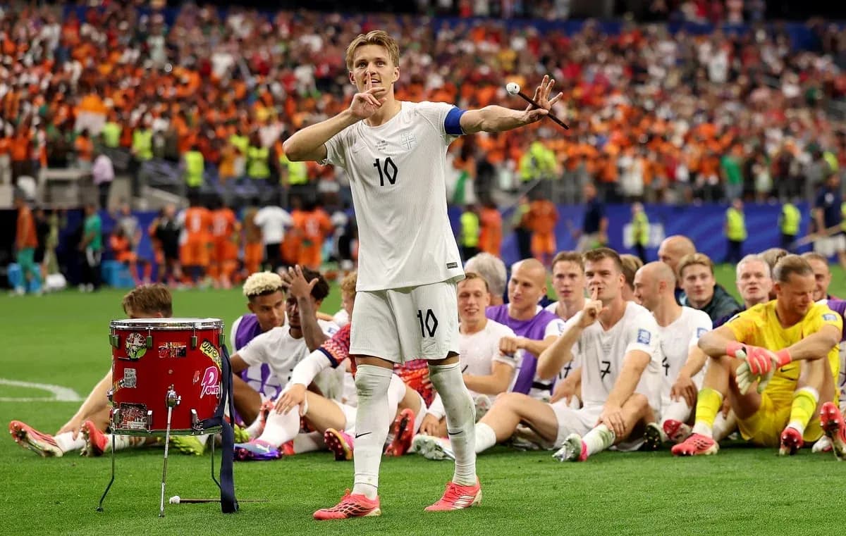 Player celebrating with teammates after a match Player celebrating with teammates after a match