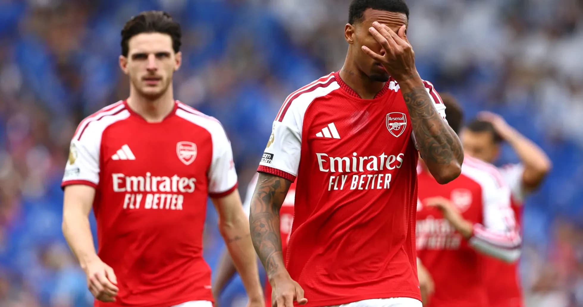 Arsenal players walking off the pitch after defeat Arsenal players walking off the pitch after defeat