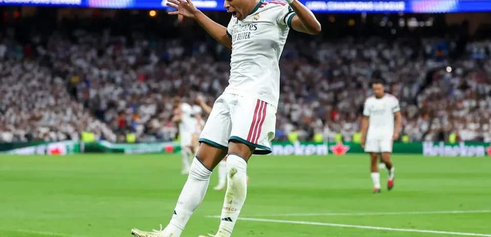 Player celebrating a goal during Champions League match Player celebrating a goal during Champions League match