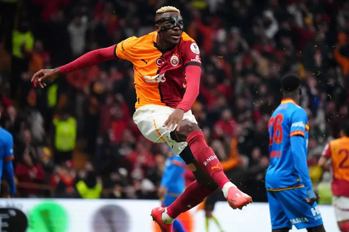 Player celebrating goal in Galatasaray jersey Player celebrating goal in Galatasaray jersey