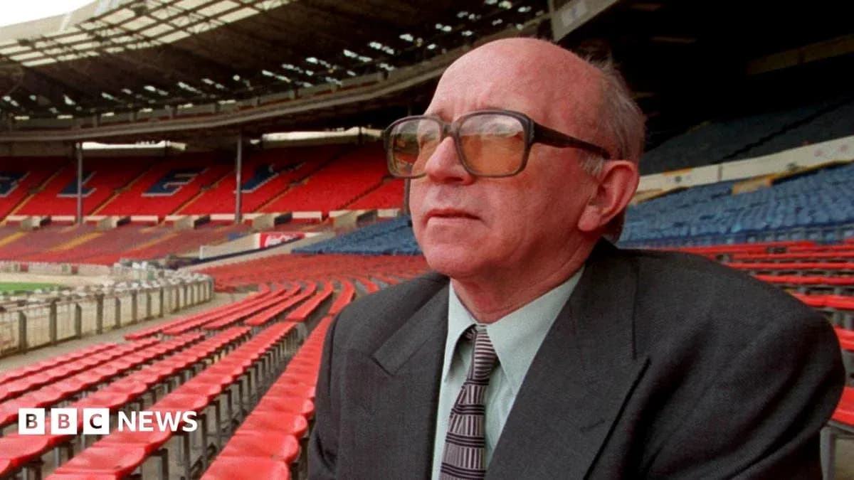 Man sitting in empty stadium stands looking ahead Man sitting in empty stadium stands looking ahead