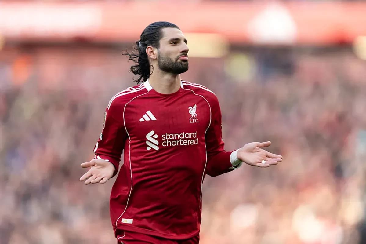 Player gesturing during a Liverpool match Player gesturing during a Liverpool match