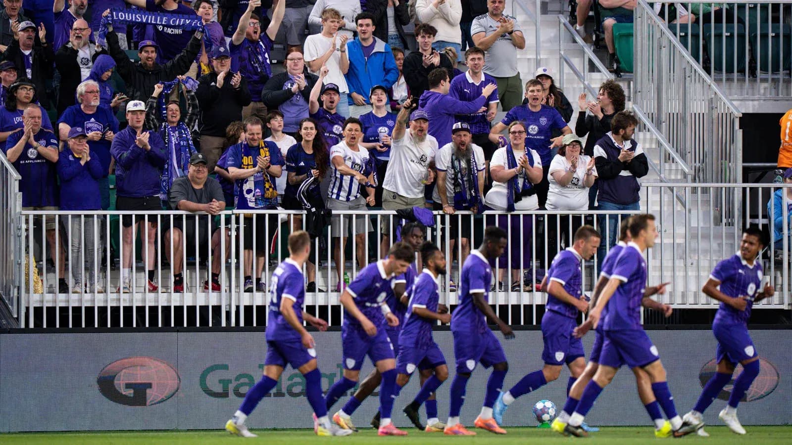 Louisville City fans celebrating during the match Louisville City fans celebrating during the match