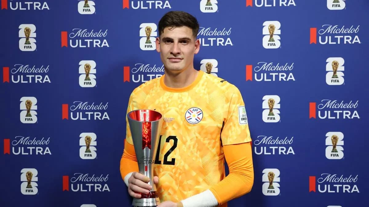 Goalkeeper holding trophy at FIFA event backdrop Goalkeeper holding trophy at FIFA event backdrop