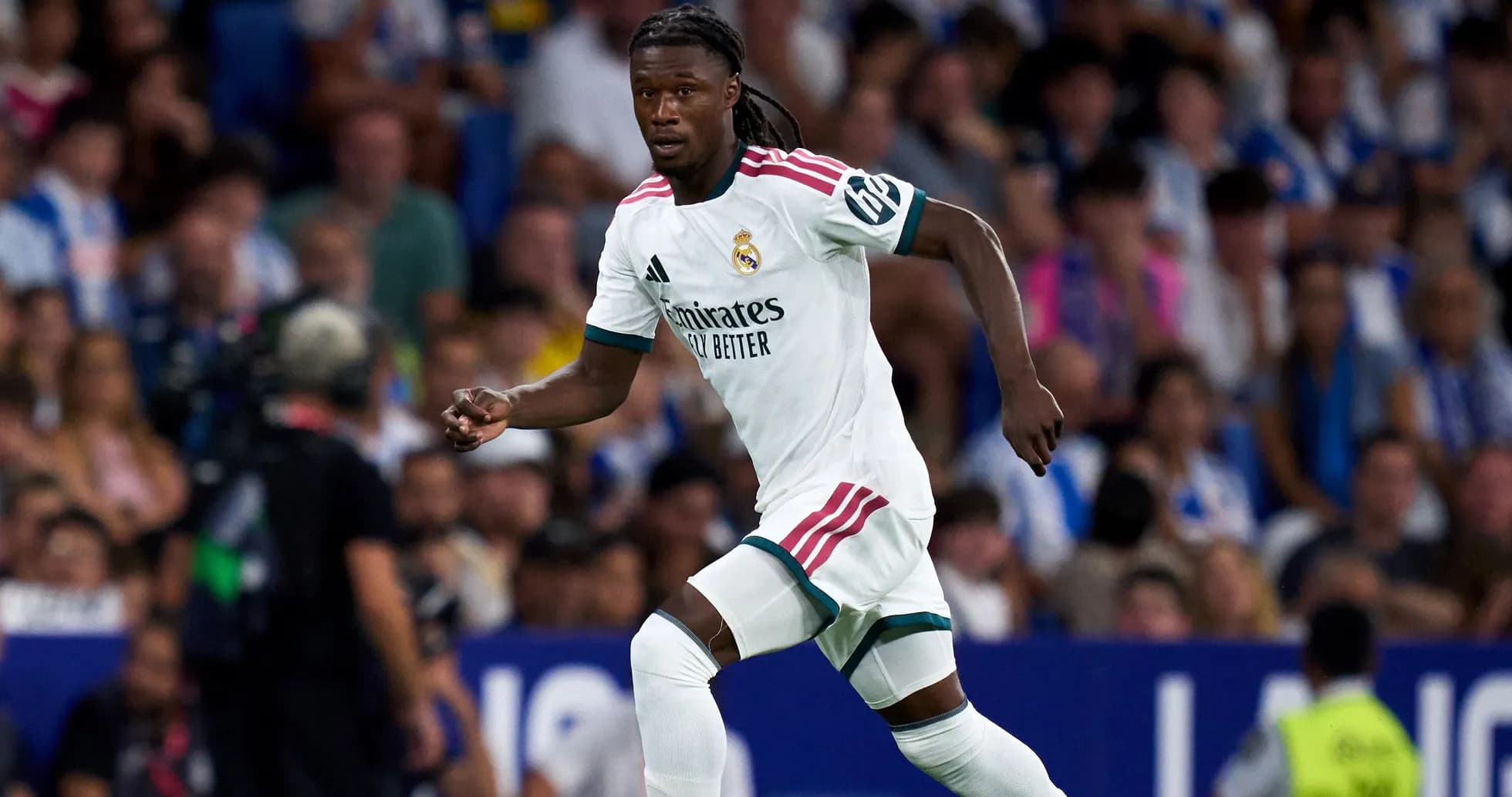 Player running during a Real Madrid match Player running during a Real Madrid match