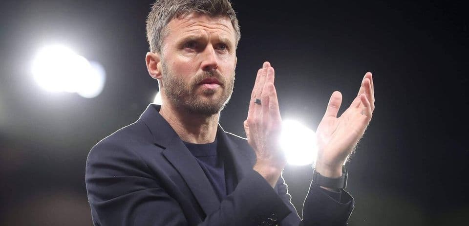 Coach applauding during a match or event Coach applauding during a match or event
