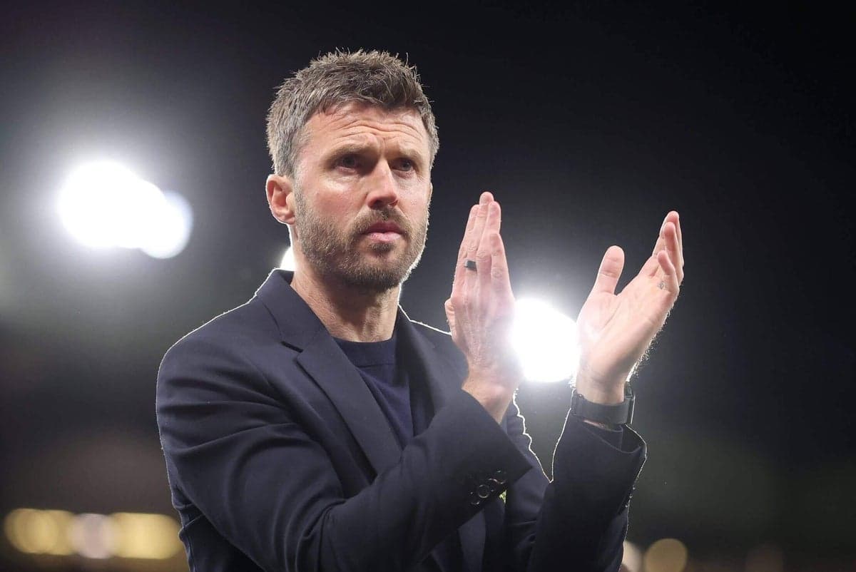 Coach applauding during a match or event Coach applauding during a match or event