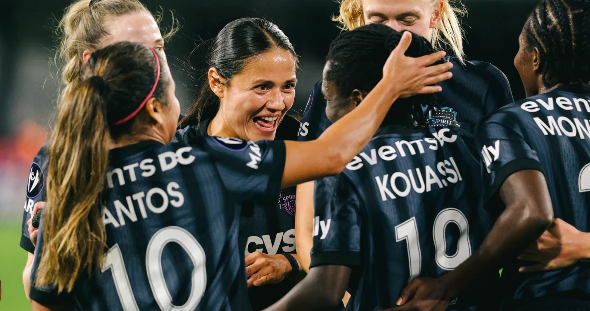 Washington Spirit players celebrating a goal Washington Spirit players celebrating a goal