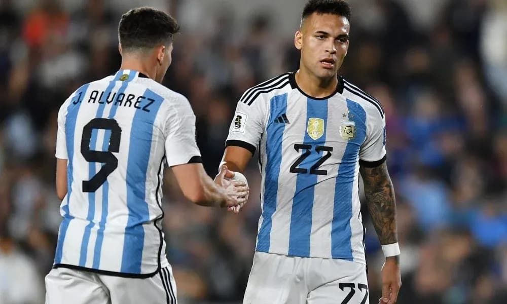 Two Argentina players shaking hands during match Two Argentina players shaking hands during match