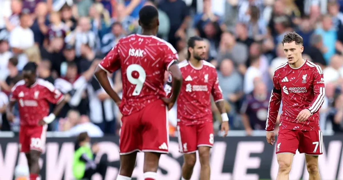 Liverpool players on the pitch after a match Liverpool players on the pitch after a match