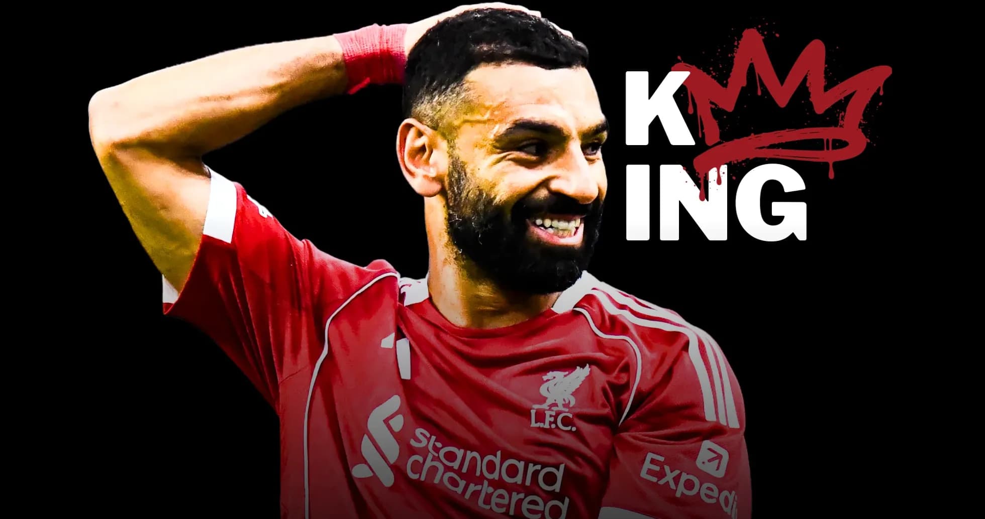 Player celebrating in Liverpool jersey with crown graphic Player celebrating in Liverpool jersey with crown graphic