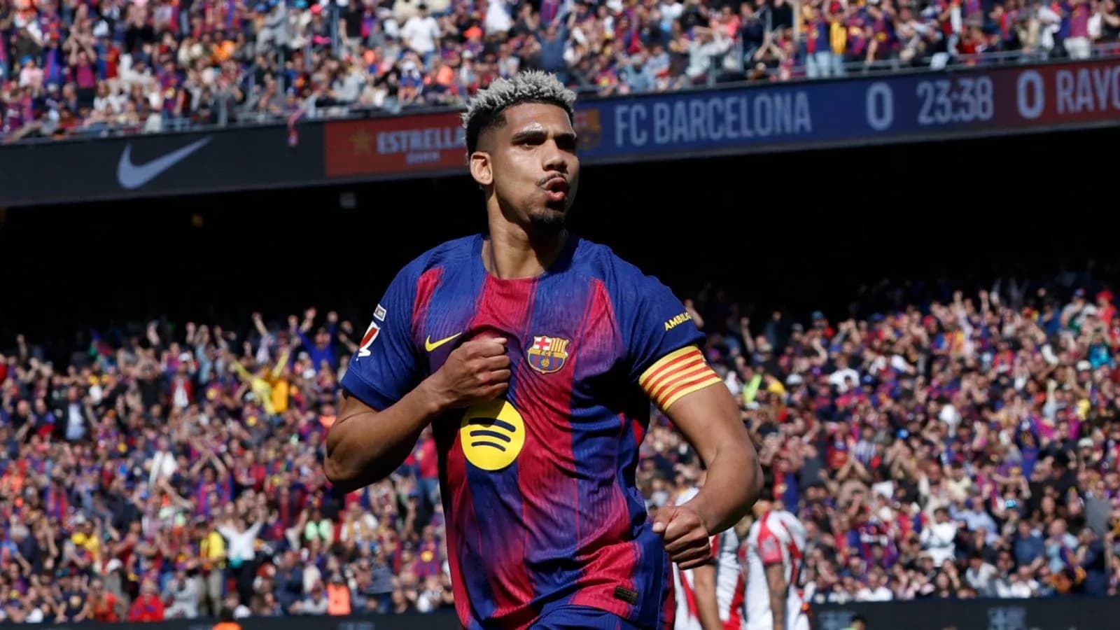 Player celebrating a goal for FC Barcelona Player celebrating a goal for FC Barcelona