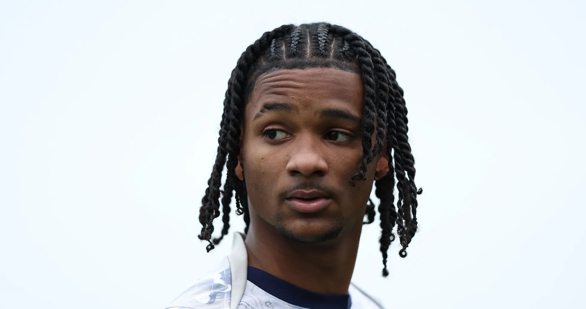 Player with braided hair looking sideways Player with braided hair looking sideways