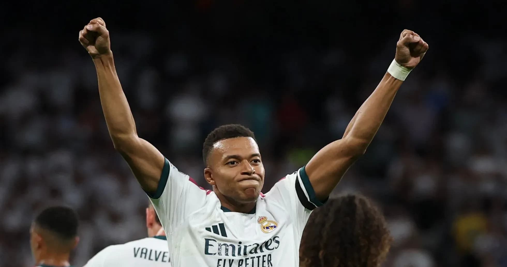 Player celebrating a goal during a match Player celebrating a goal during a match