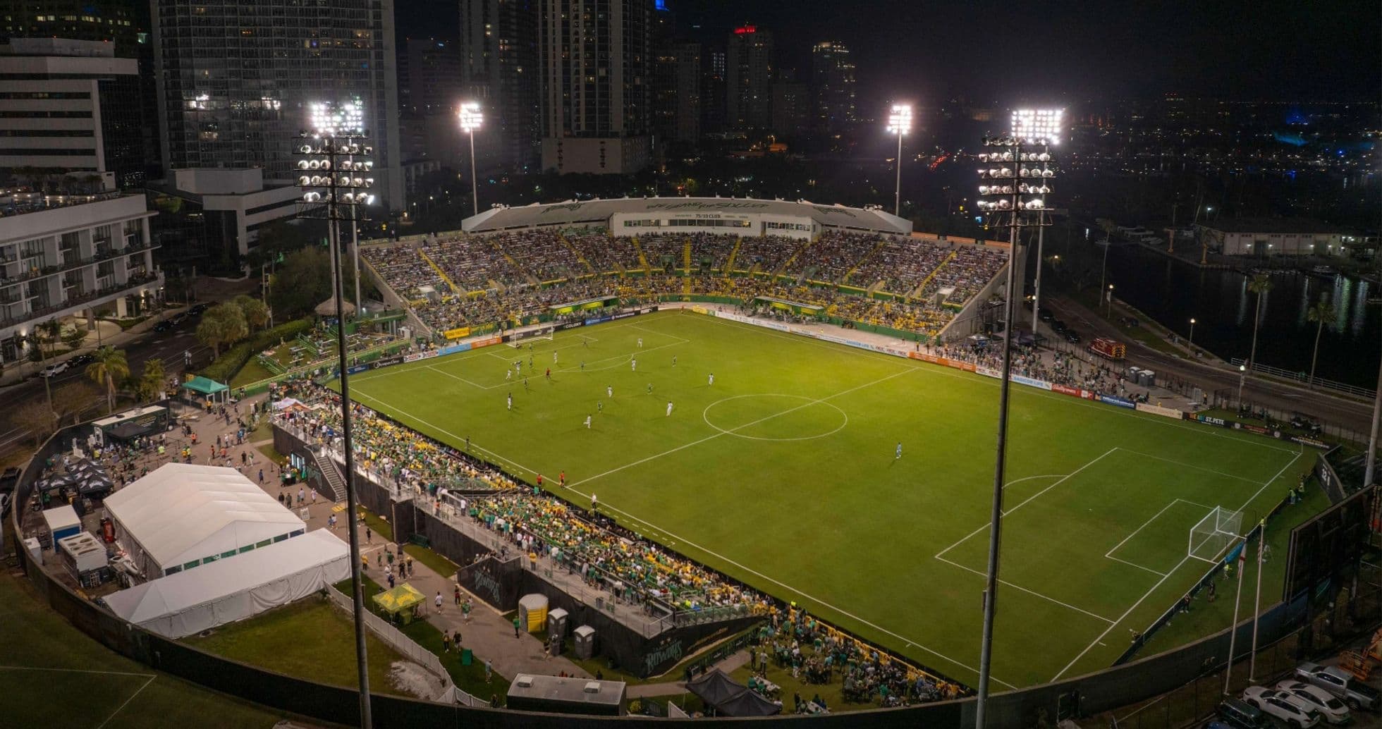 Night view of a football match in stadium Night view of a football match in stadium