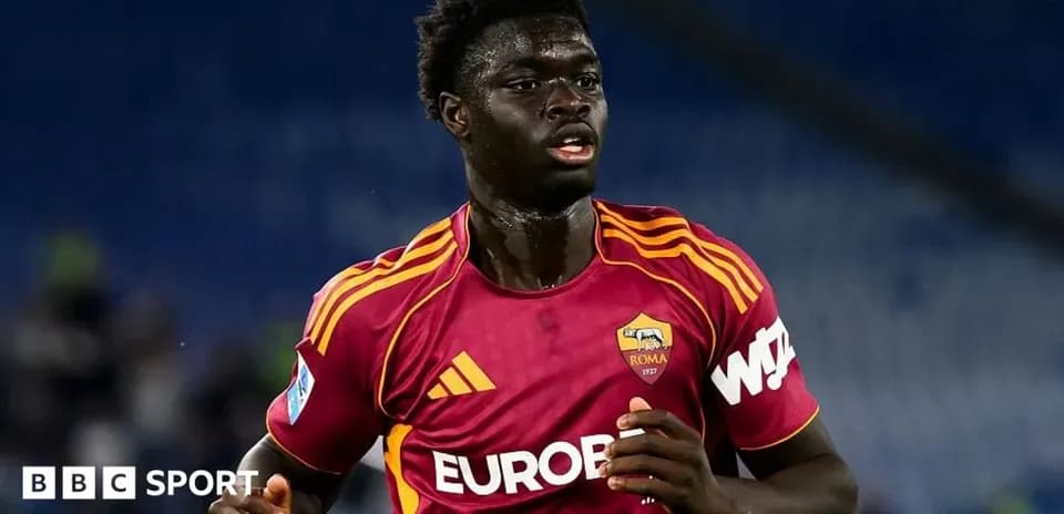 Player in AS Roma kit running during match Player in AS Roma kit running during match