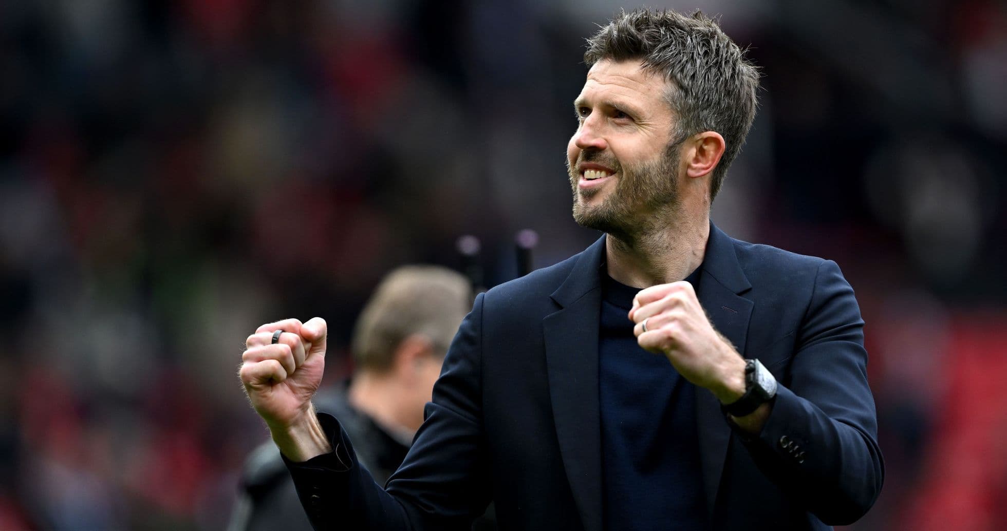 Coach celebrating with clenched fist after match Coach celebrating with clenched fist after match
