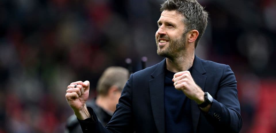 Coach celebrating with clenched fist after match Coach celebrating with clenched fist after match