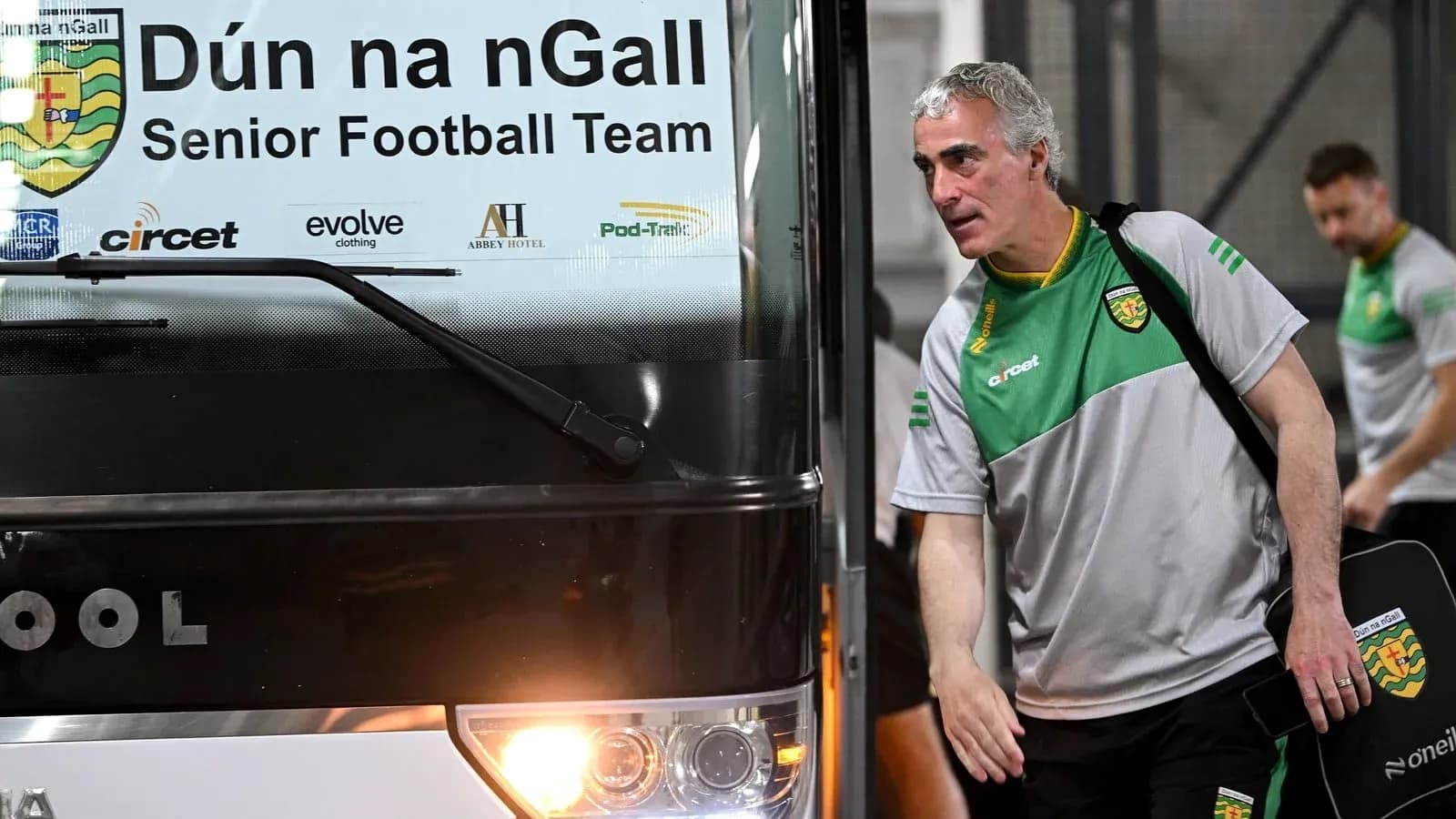 Manager arriving at bus for Dún na nGall team Manager arriving at bus for Dún na nGall team