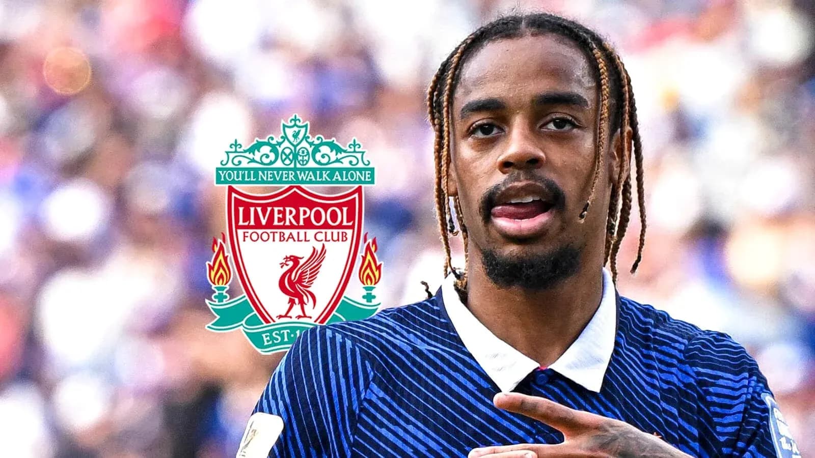 Player gesturing in front of Liverpool FC logo Player gesturing in front of Liverpool FC logo