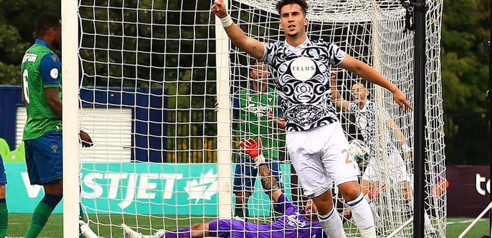 Player celebrating goal in Canadian Premier League match Player celebrating goal in Canadian Premier League match