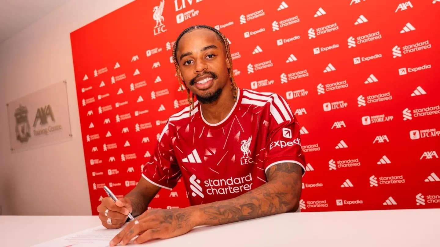 Player signing contract at Liverpool FC press event Player signing contract at Liverpool FC press event