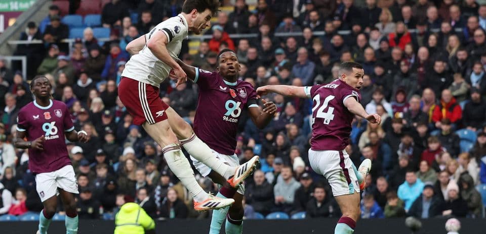 Arsenal player attempting a header against Burnley Arsenal player attempting a header against Burnley