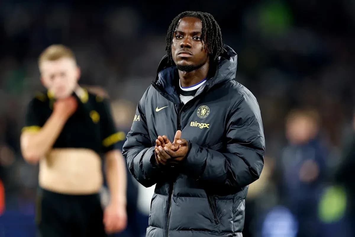 Player in Chelsea jacket applauding after match Player in Chelsea jacket applauding after match