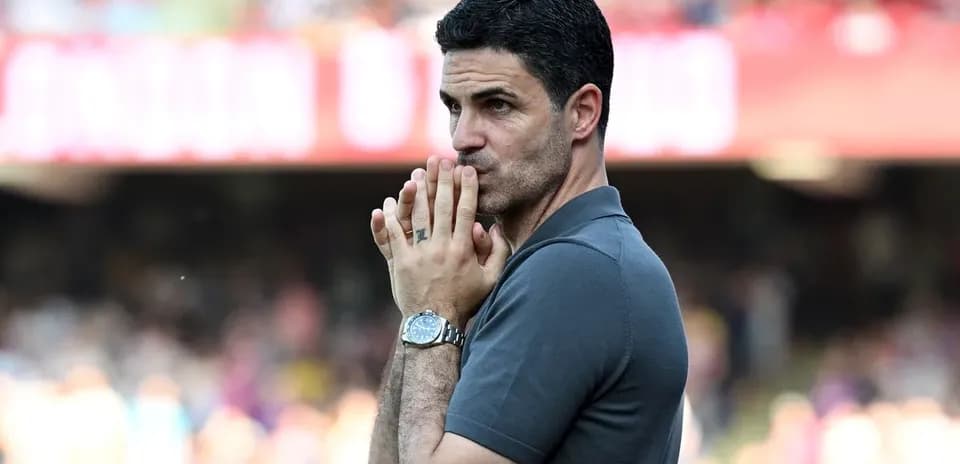 Coach observing match with hands clasped together Coach observing match with hands clasped together