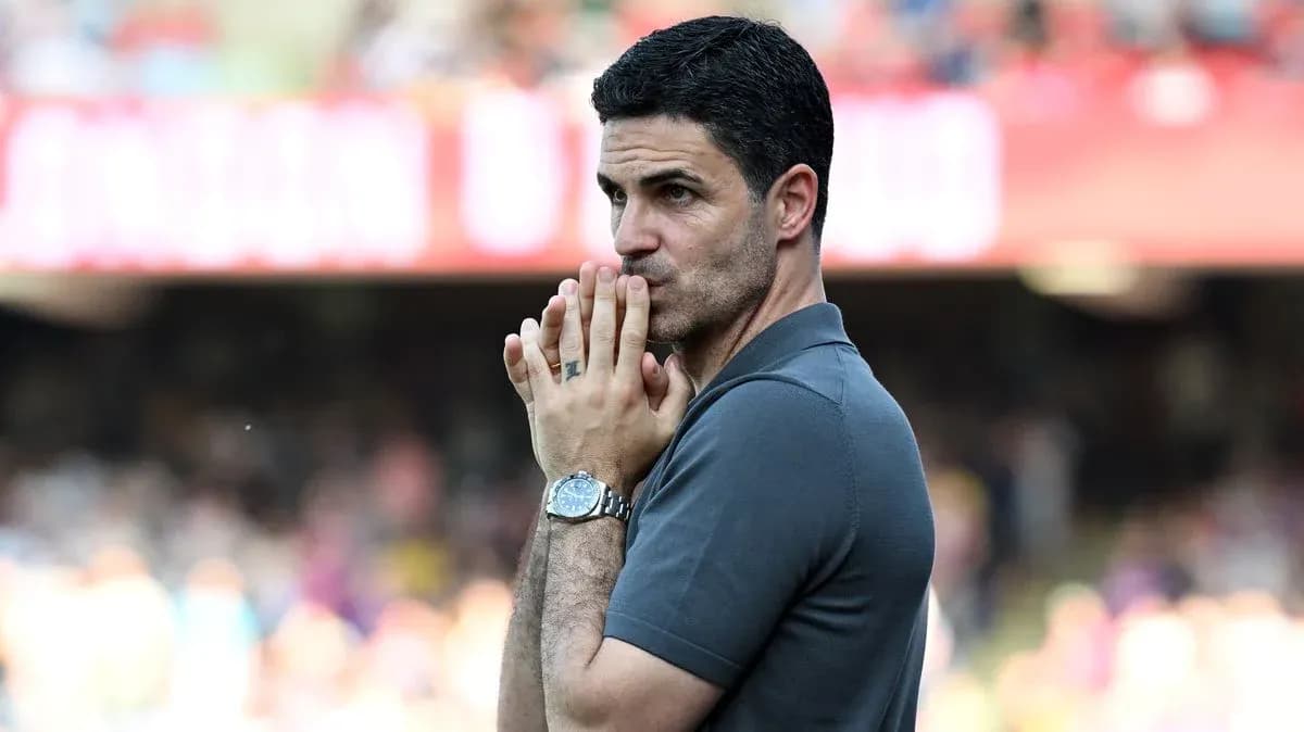 Coach observing match with hands clasped together Coach observing match with hands clasped together