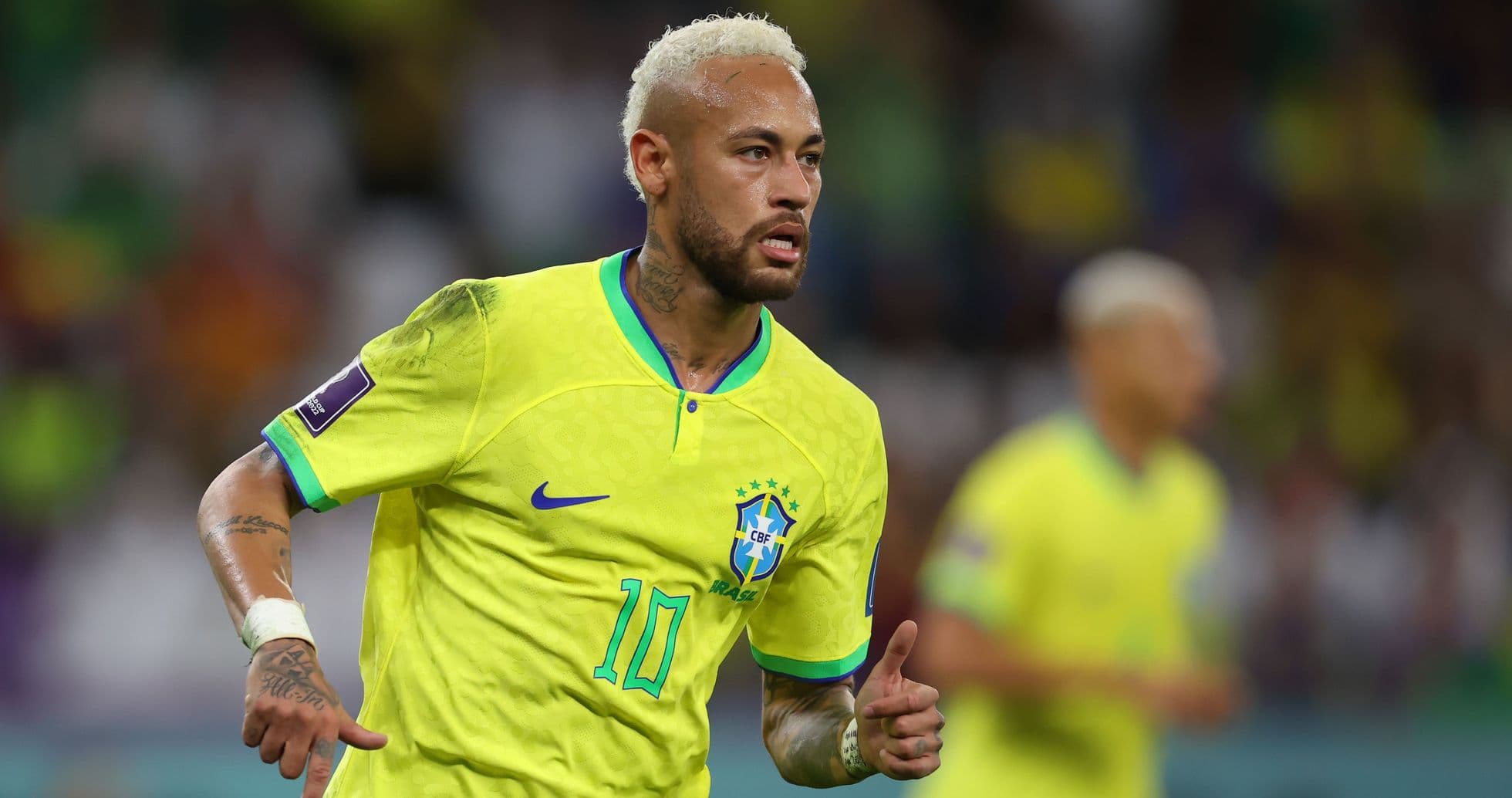 Neymar running in Brazil's yellow jersey during match Neymar running in Brazil's yellow jersey during match