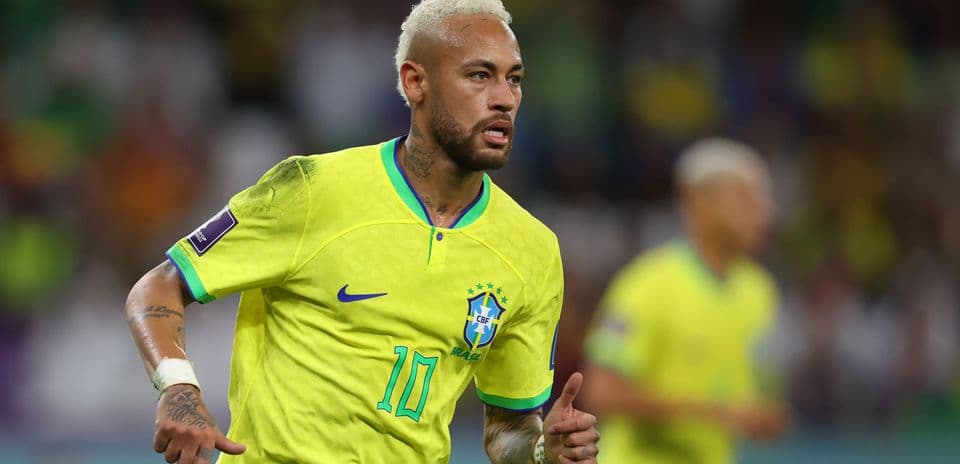 Neymar running in Brazil's yellow jersey during match Neymar running in Brazil's yellow jersey during match