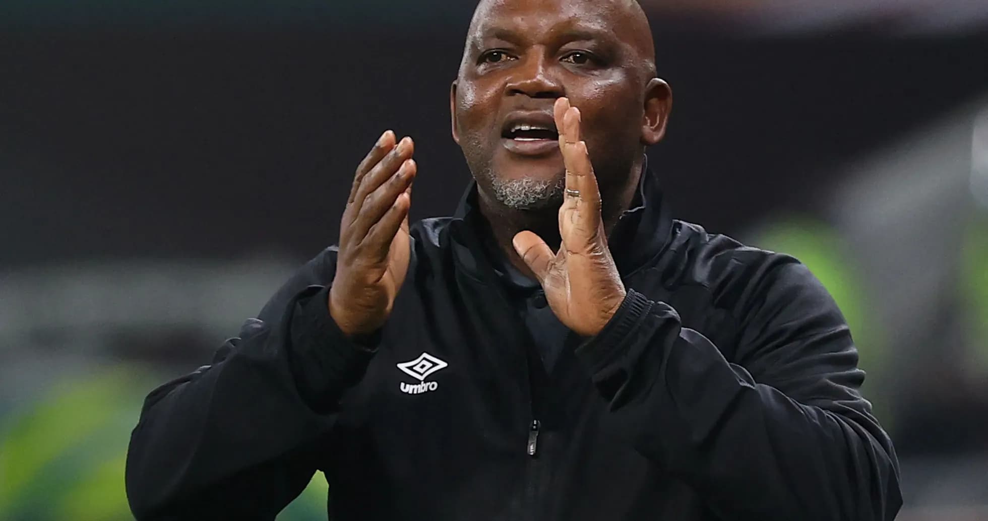 Coach gesturing during a match from the sidelines Coach gesturing during a match from the sidelines