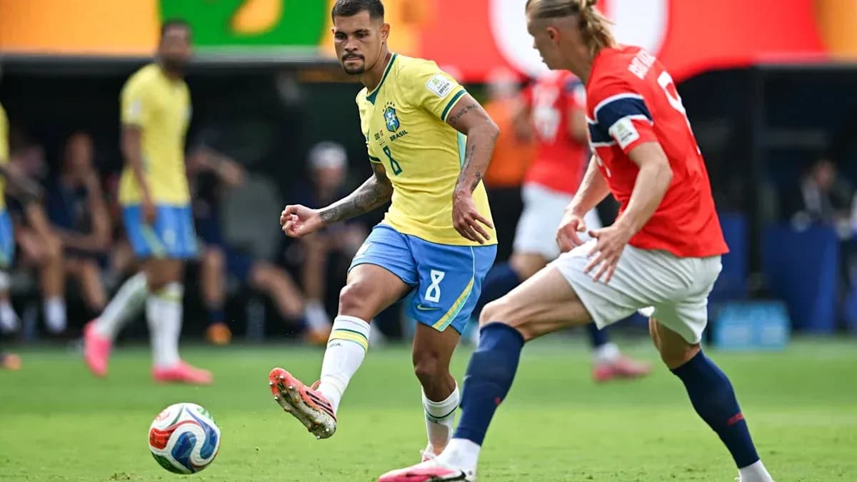 Brazilian player dribbling past Norwegian defender during match Brazilian player dribbling past Norwegian defender during match