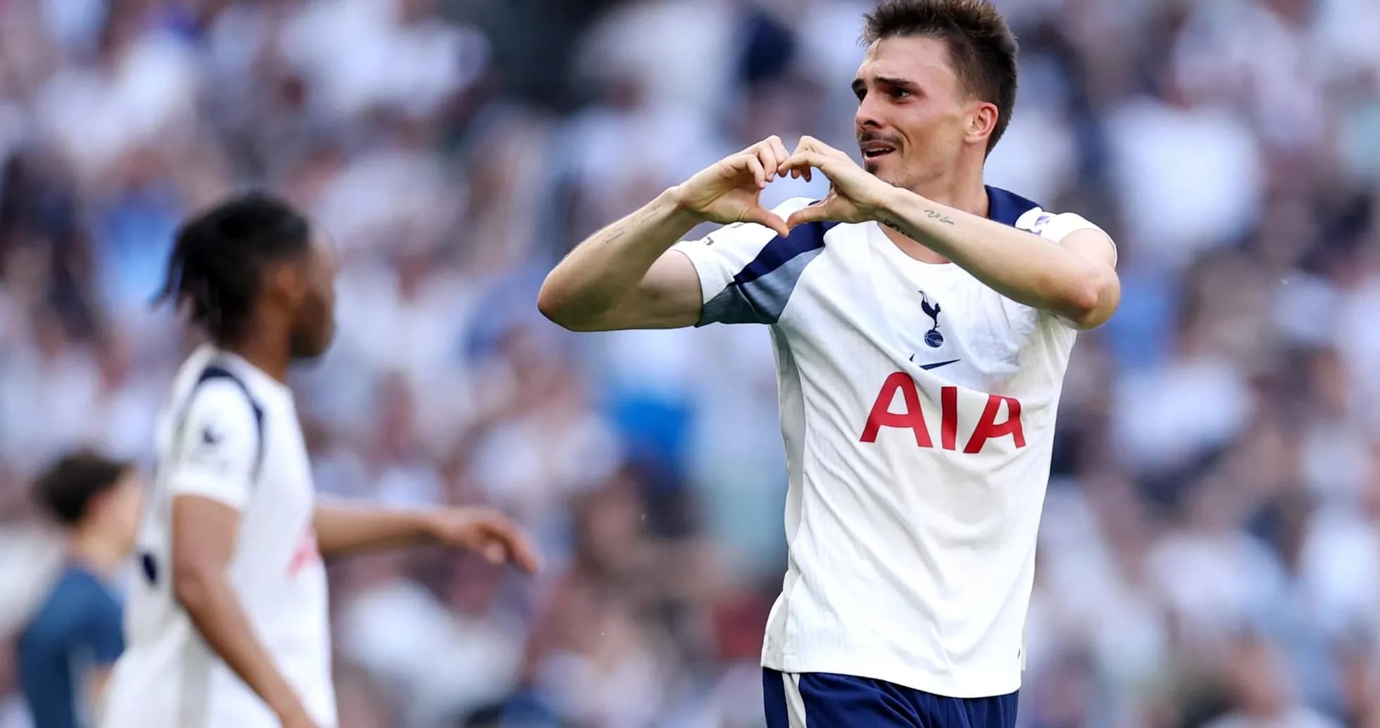 Tottenham player celebrating during match Tottenham player celebrating during match