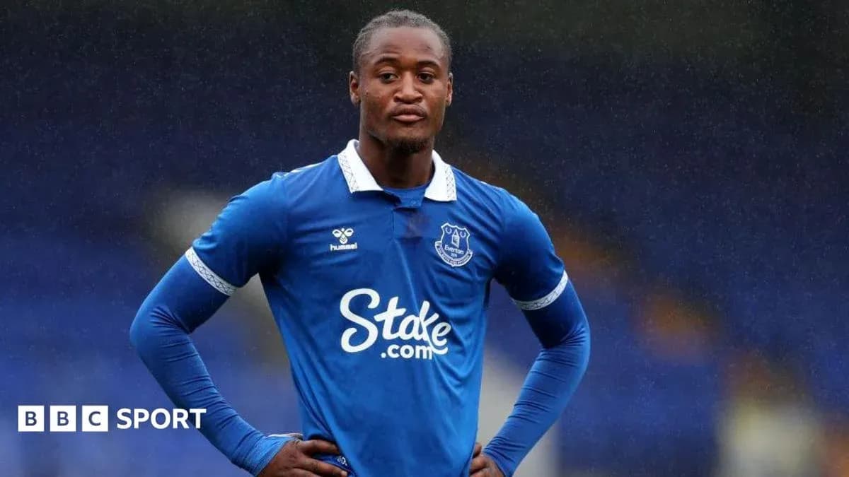 Everton player standing on the pitch during match Everton player standing on the pitch during match