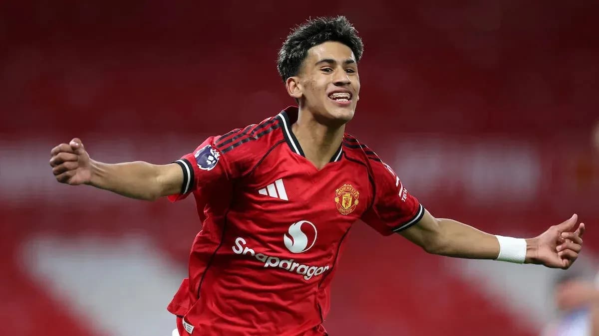 Player celebrating a goal in Manchester United kit Player celebrating a goal in Manchester United kit